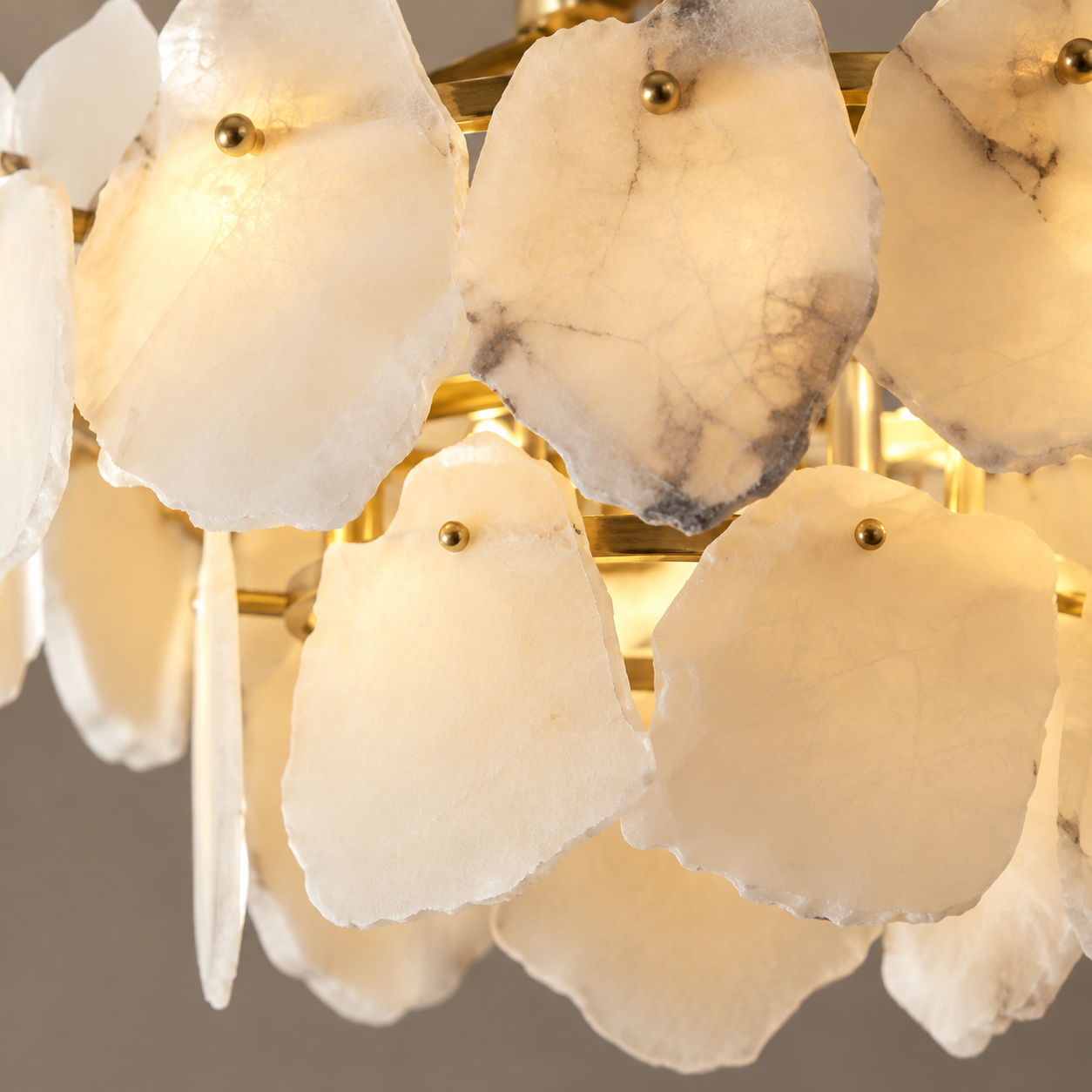 Natural alabaster stone panels and copper details of chandelier