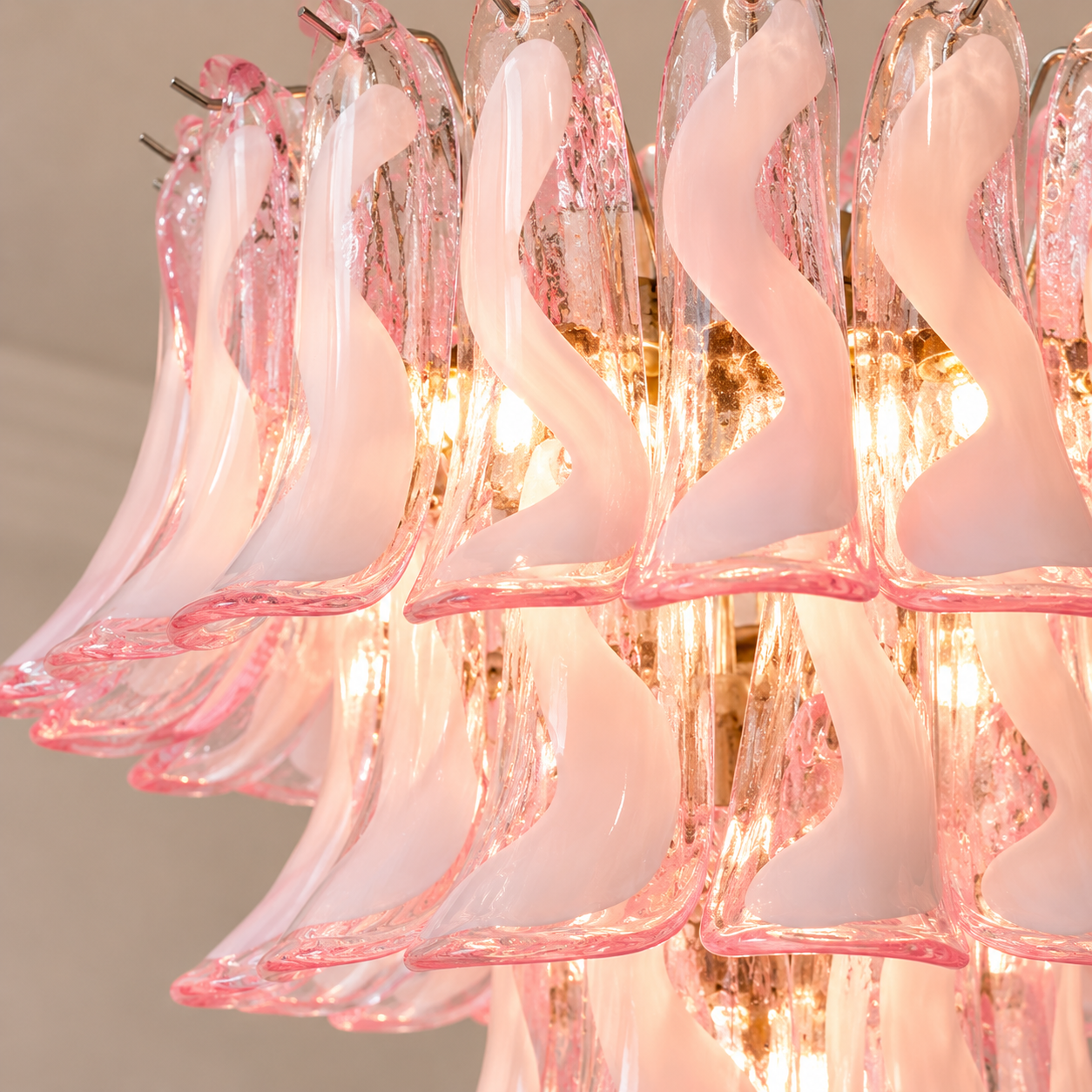 Close-up detail of Korianora sculptural pink layered glass chandelier